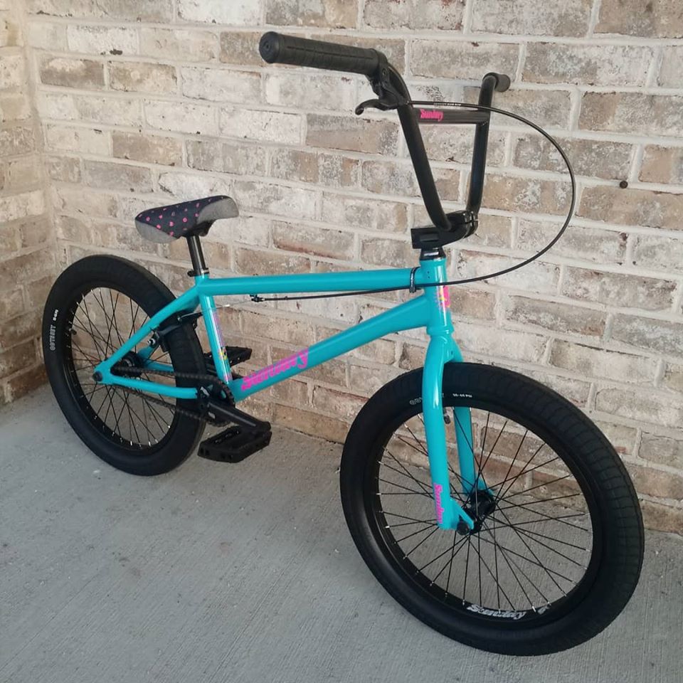 blue and pink bmx bike